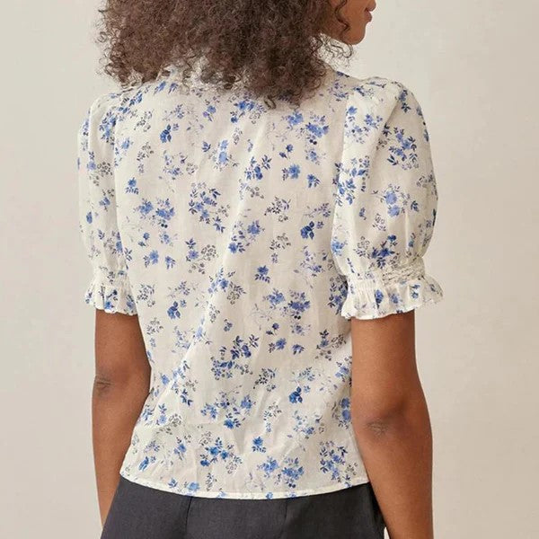 Blouse met bloemenmotief en kanten zoom